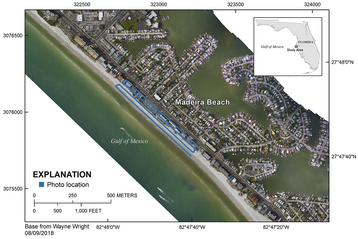 Aerial map of the study area showing a swath of barrier island diagonally, with sea to the bottom left, a strip of beach in the center, and housing developments to the north. Blue dots show the photo flight line, and an inset map and scale give more detail.